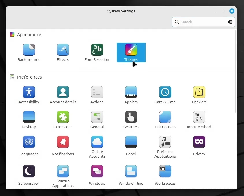 The system Themes button is the last item in the Appearance category in the Cinnamon System Settings.